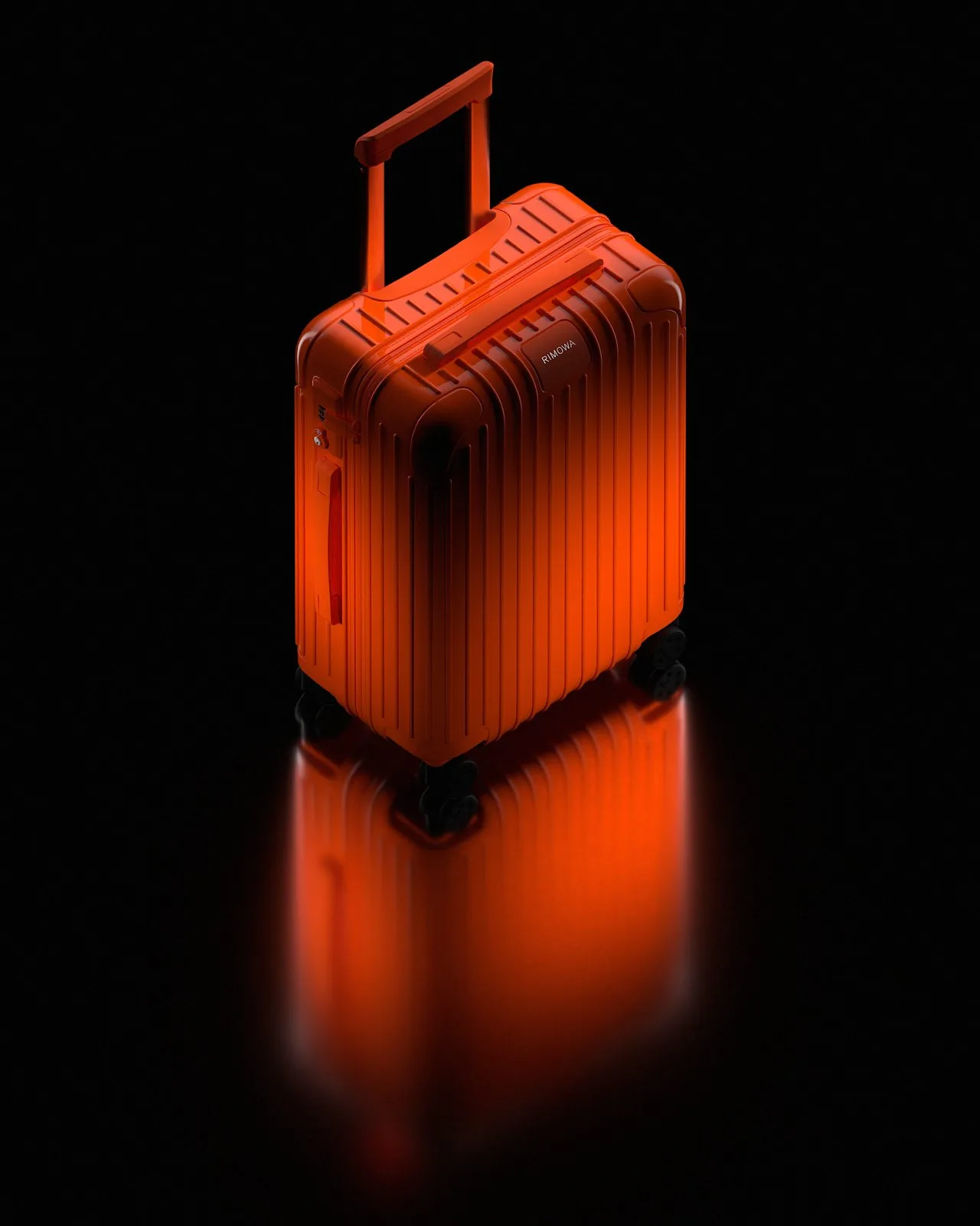 Rimowa — suitcase render on dark backdrop with reflection