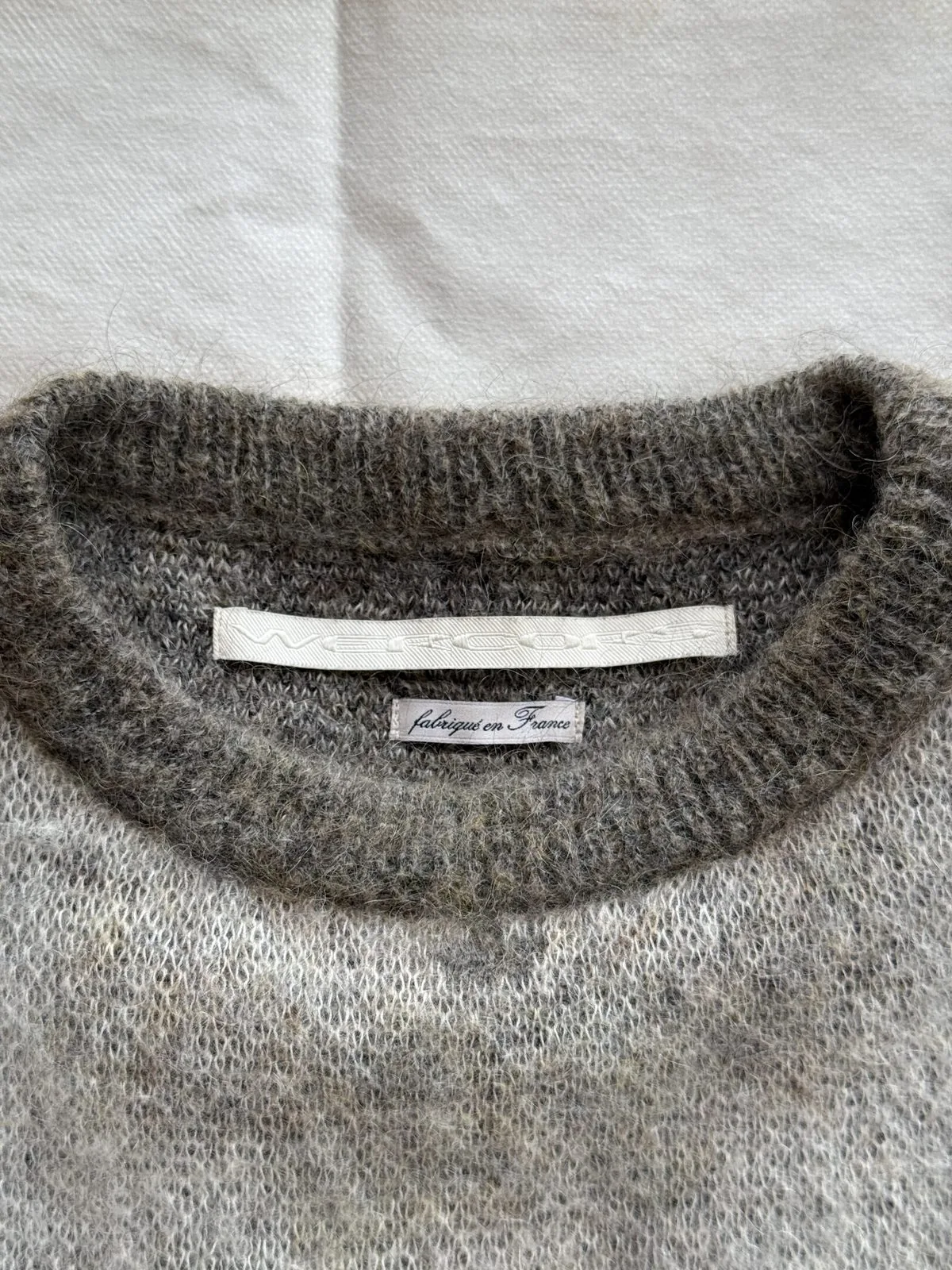 Wercors — woven label detail, sweater collar close-up