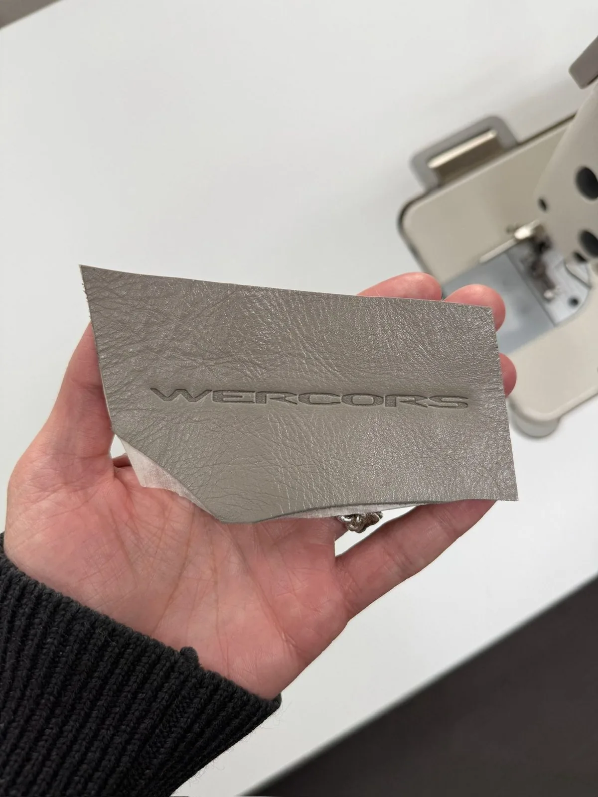 Wercors — embossed leather tag detail